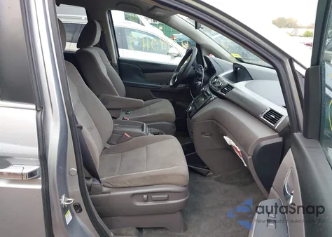 2016 Honda Odyssey Se z USA, uszkodzony, nr VIN 5FNRL5H38GB101034